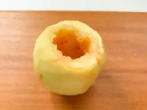 Earl Grey Peach Sando: Korean Cafe Fruit Sandwich Scooping the core seed out of a whole peach