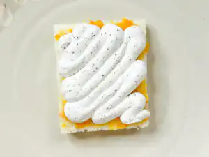 Earl Grey Peach Sando: Korean Cafe Fruit Sandwich Pipe chilled Earl Grey cream onto one jam-spread slice of milk bread for peach sando