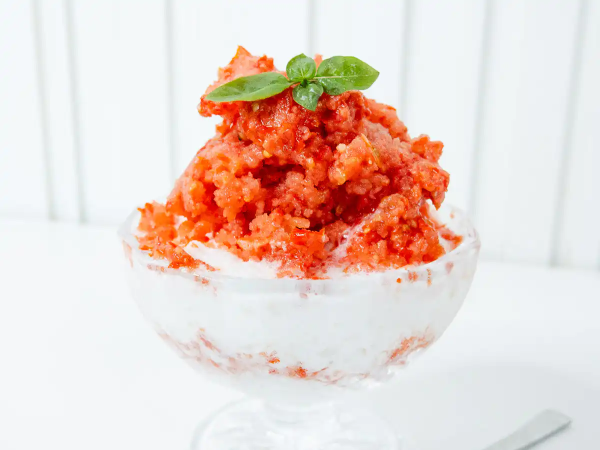 Tomato Bingsu: Easy Bingsu Recipe with Greek Yogurt Soft lighting highlighting the smooth texture of frozen tomato bingsu purée.
