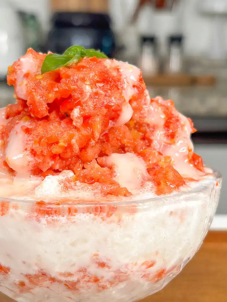 Tomato Bingsu: Easy Bingsu Recipe with Greek Yogurt Drizzling sweetened condensed milk over a freshly layered tomato bingsu dessert.