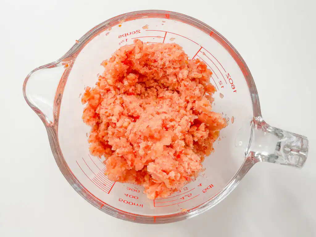 Tomato Bingsu: Easy Bingsu Recipe with Greek Yogurt Pouring sugar and lemon juice over frozen tomatoes in the blender.