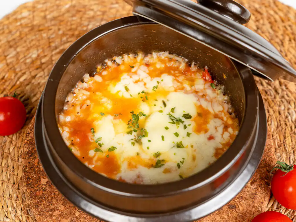 Tomato Rice Recipe: 10 Min Easy Cheesy Korean Pot Rice Cooking in a traditional ttukbaegi keeps your cheesy tomato rice hot until the last bite.