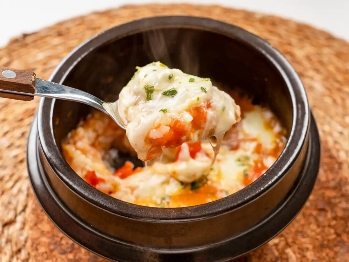 Tomato Rice Recipe: 10 Min Easy Cheesy Korean Pot Rice e gooey mozzarella cheese pull makes this tomato rice recipe irresistible.