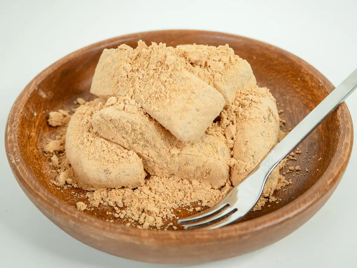 5 Min Microwave Injeolmi: Quick Korean Sweet Rice Cake A cozy indoor setting featuring a plate of korean dessert rice cake.