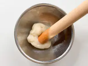 5 Min Microwave Injeolmi: Quick Korean Sweet Rice Cake Pounding the hot rice cake dough vigorously with the oiled rolling pin.