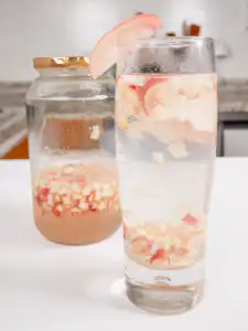 Korean Peach Syrup (Peach Cheong Recipe) for Peach Ade Beautiful natural layers before stirring—sweet fruit syrup at the bottom and bubbly soda on top!