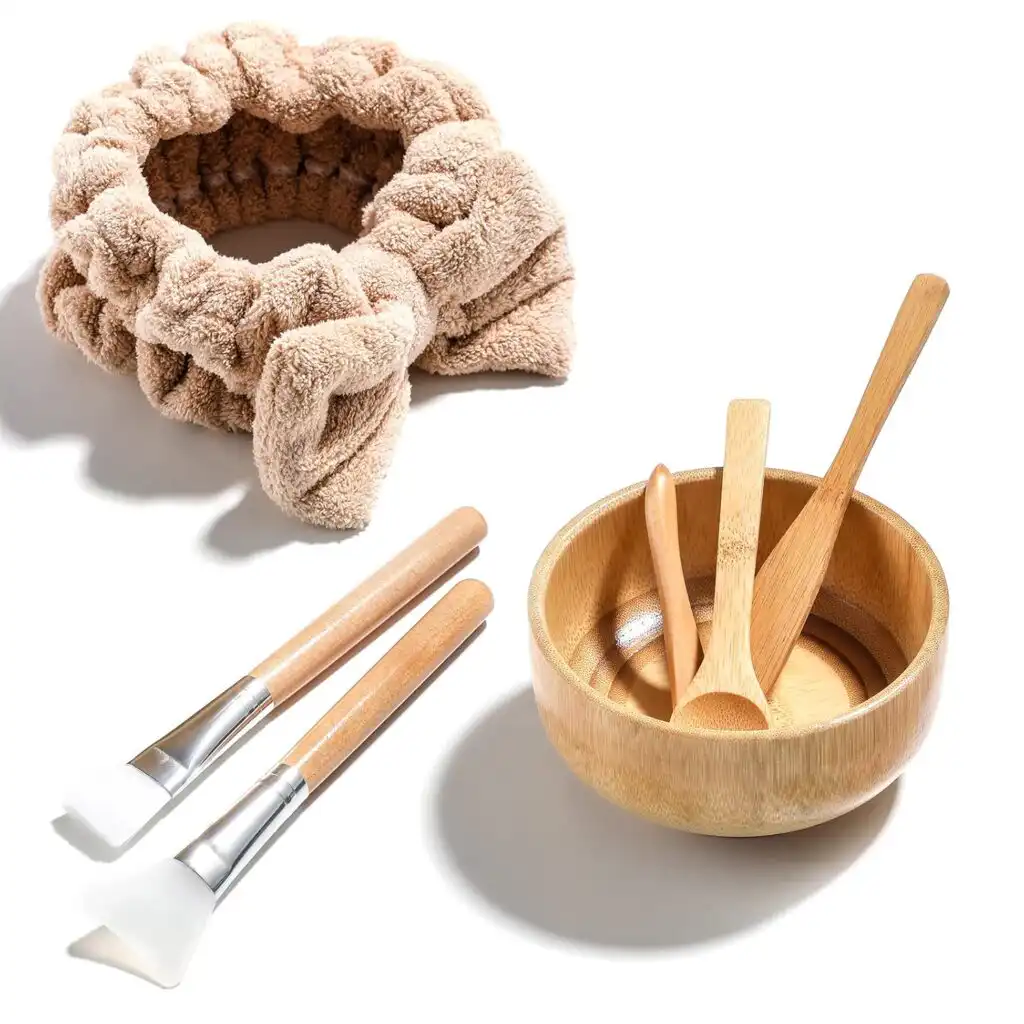 Bamboo facial mask bowl, spatulas, brushes, and headband for mixing a honey and Vaseline face mask