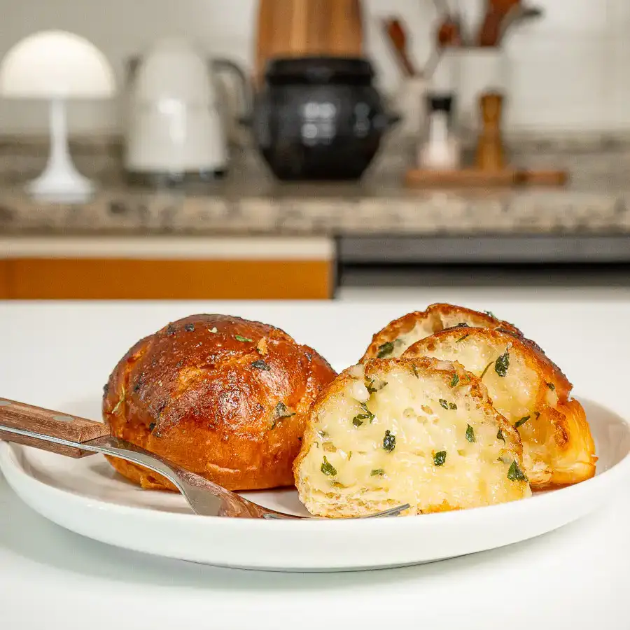 Korean Sweet Garlic Bread with Dinner Rolls: No Cream Cheese, Air Fryer Macro shot of garlic and parsley on top of Korean garlic bread