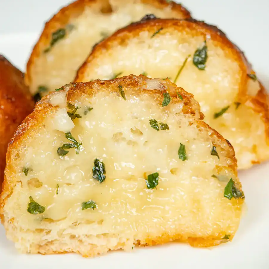 Korean Sweet Garlic Bread with Dinner Rolls: No Cream Cheese, Air Fryer Close-up texture of crispy Korean garlic bread crust
