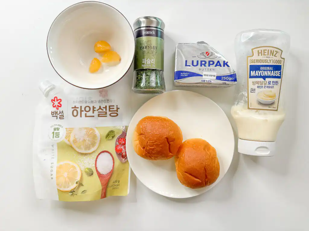 Korean Sweet Garlic Bread with Dinner Rolls: No Cream Cheese, Air Fryer Ingredients for Korean garlic bread: dinner rolls, butter, minced garlic, mayonnaise, sugar and dried parsley