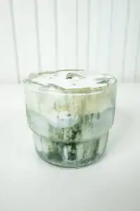 Korean Mugwort Latte: Easy Caffeine-Free Cream Ssuk Latte Vertical close-up of a Korean Mugwort Latte, with cream foam and mugwort gradient filling the frame