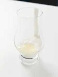Korean Mugwort Latte: Easy Caffeine-Free Cream Ssuk Latte Condensed milk and whipping cream being mixed with a small electric frother as the cream foam rises, Ssuk Latte milk foam