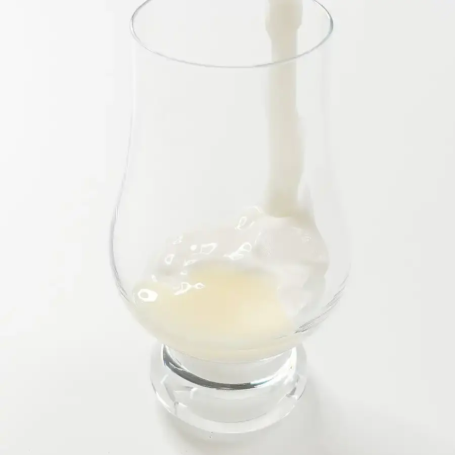 Korean Mugwort Latte: Easy Caffeine-Free Cream Ssuk Latte Condensed milk and whipping cream being mixed with a small electric frother as the cream foam rises, Ssuk Latte milk foam