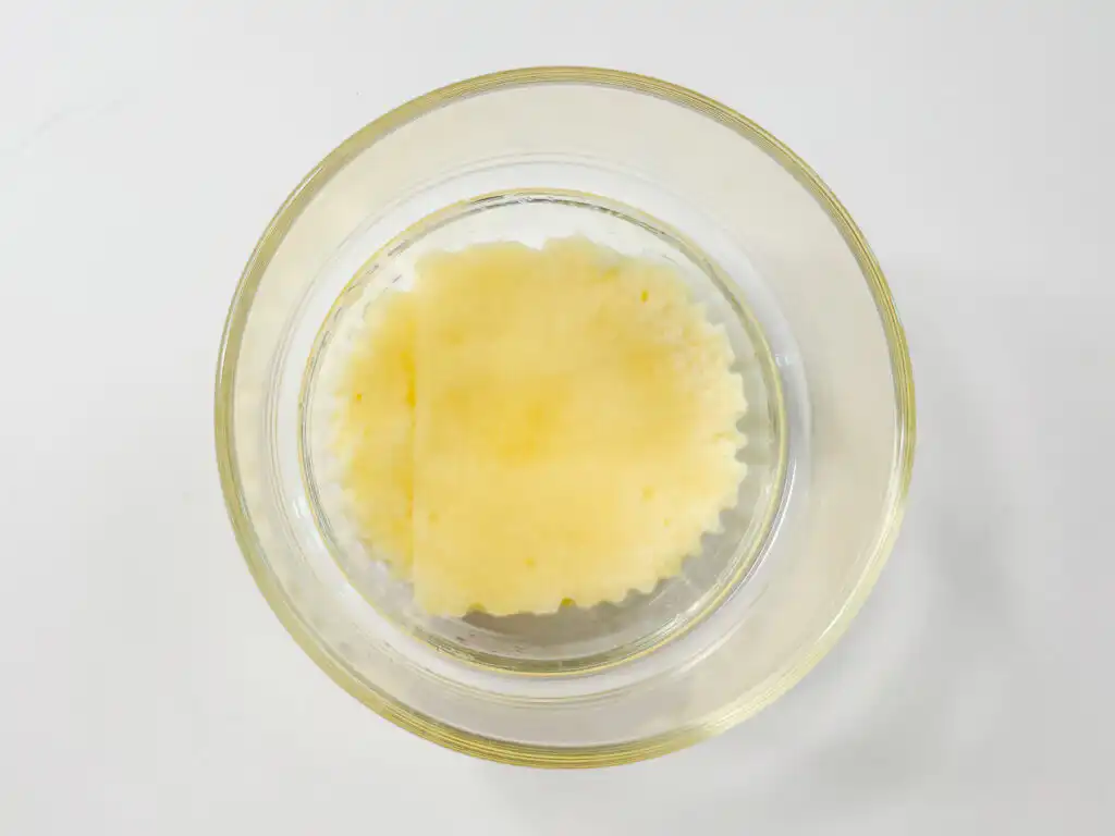 10Min Shine Muscat Cake: Korean Cream Cake with Grape Placing round Castella cake slice at the bottom of a Shine Muscat Cake glass