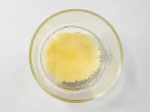 10Min Shine Muscat Cake: Korean Cream Cake with Grape Placing round Castella cake slice at the bottom of a Shine Muscat Cake glass