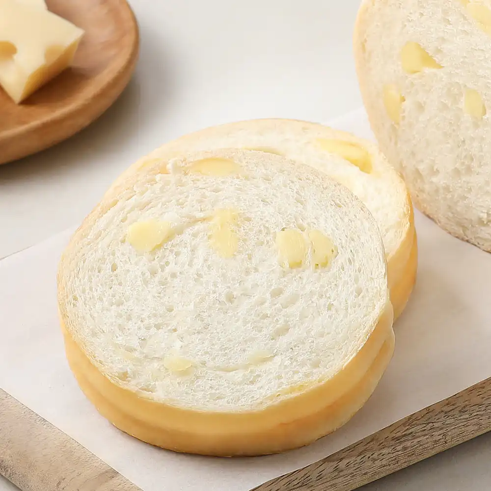 Pull-apart roll cheese bread with cheese bits, one of the best Paris Baguette bread for savory lovers