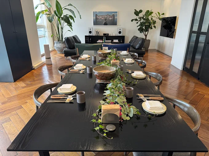 Justin Bieber Seoul Hotspots: 10 Places He Visited in Korea Long black dining table set for a private room meal at SNY, a Justin Bieber Seoul restaurant