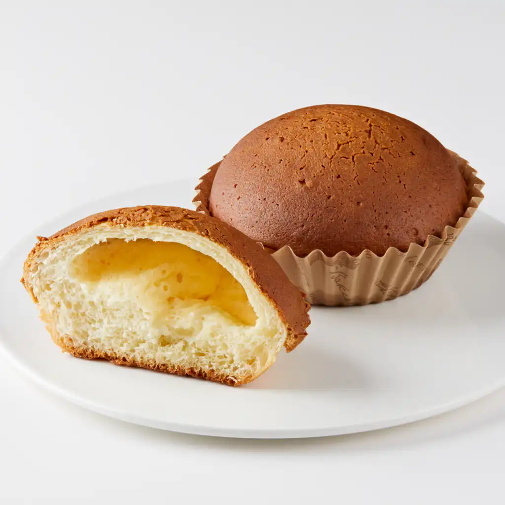 Torn coffee bun pieces with cream cheese, a local way to eat Paris Baguette Korea bread
