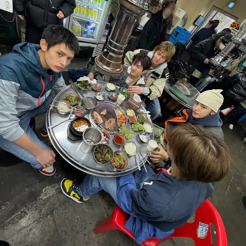 CORTIS members are eating Korean BBQ